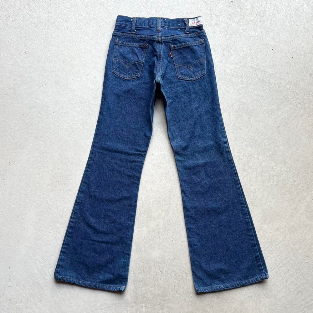vintage 1970s bell bottom orange tab levi’s jeans